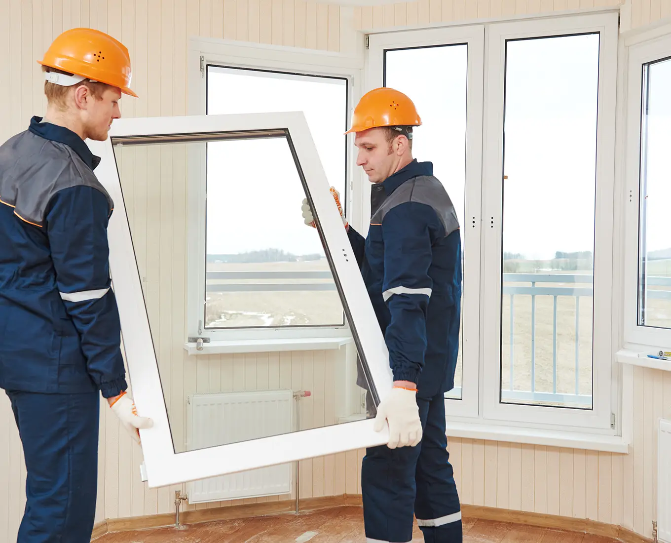 workers installing new windows in house in st louis mo