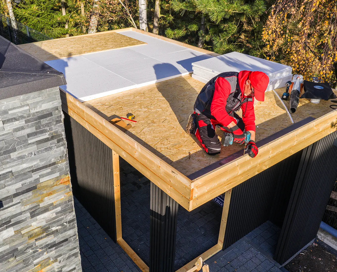 Construction Work on a Flat Roof Structure in st louis mo