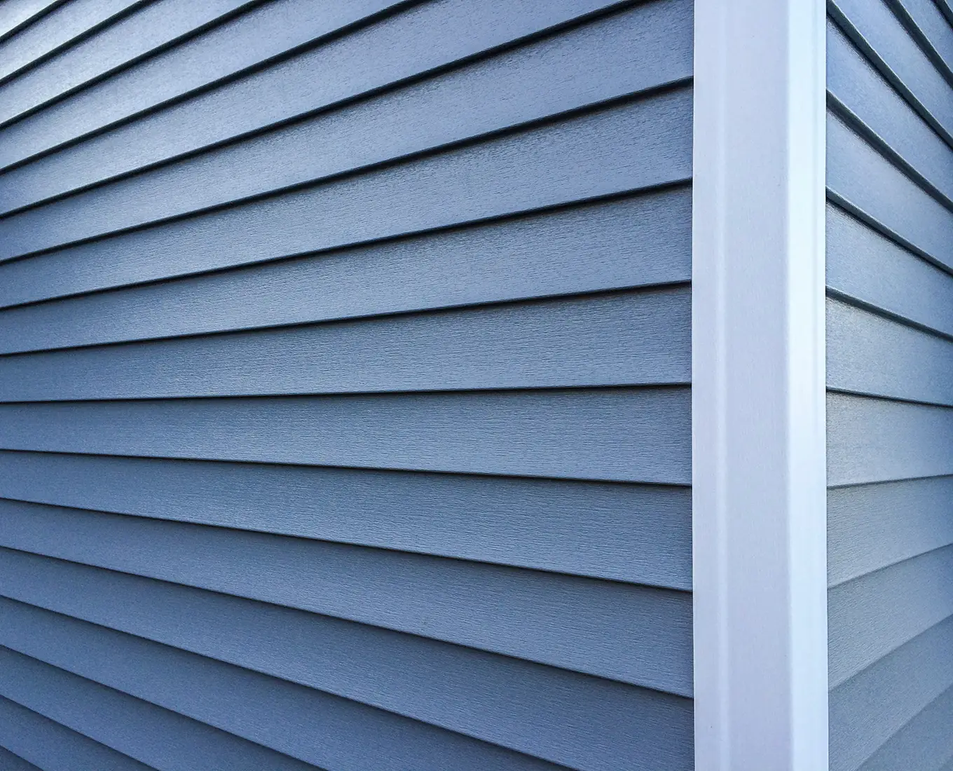 vinyl siding with white trim on the outside wall of a home in st louis mo