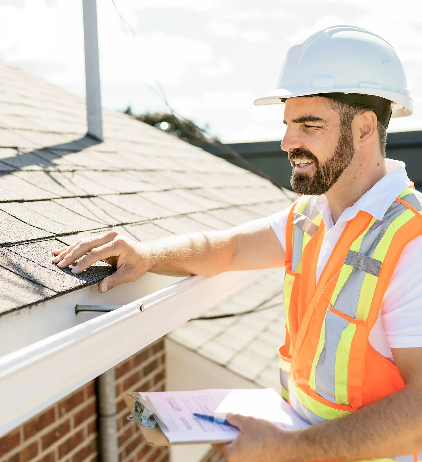 roofer performing detailed storm damage inspection & documentation process on roof in st louis mo